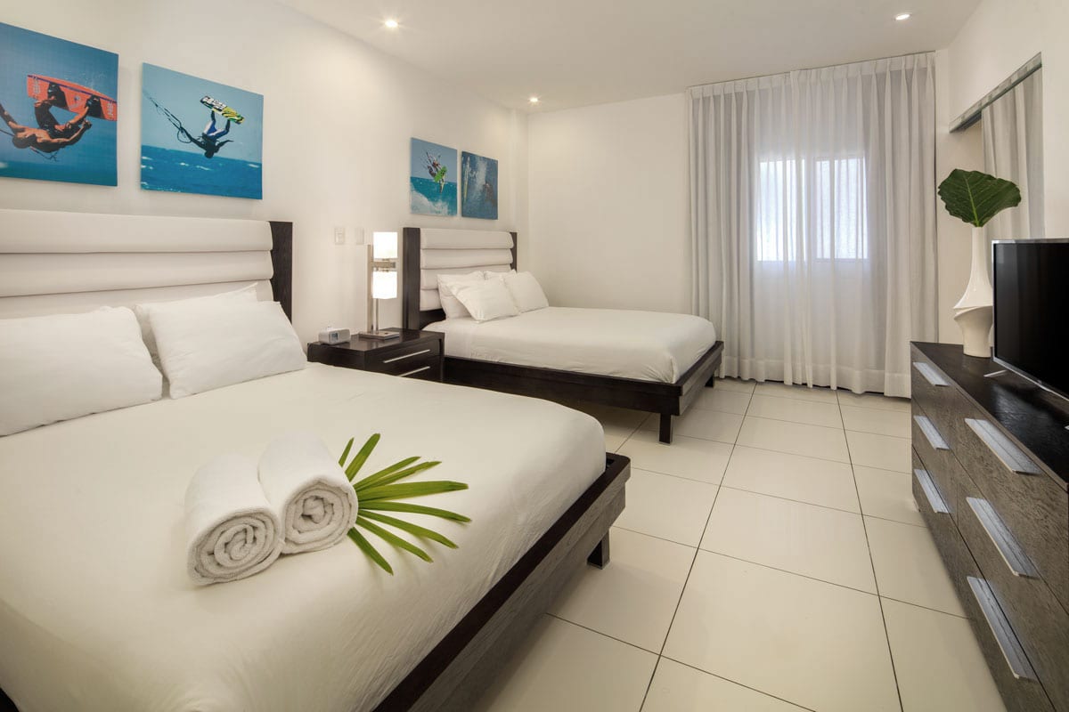 Millennium Resort and Spa interior 1 bed deluxe suite bedroom