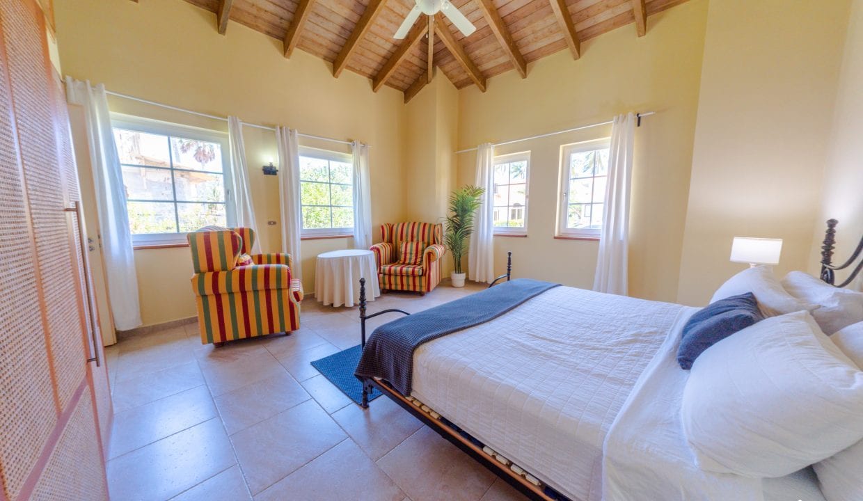 For Sale Enormous Villa Steps To The Ocean Dominican Republic Image of downstairs bedroom with seating
