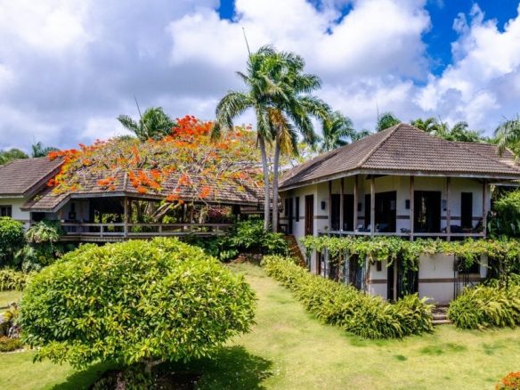 Image of For Sale Listing “Estate of Mind” Luxurious and Graceful Villa exterior side view