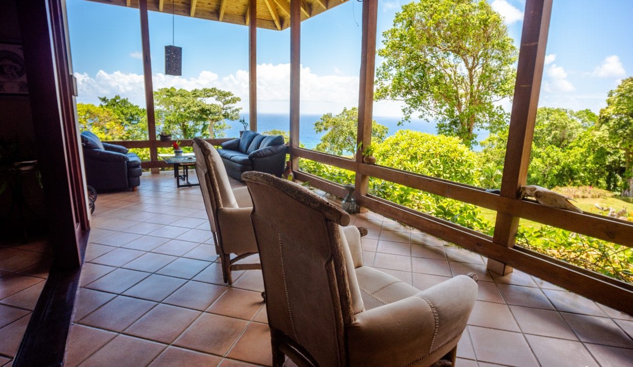 Image of For Sale Listing “Estate of Mind” Luxurious and Graceful Villa sunroom seating