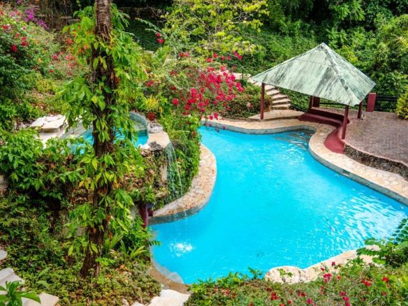 Expansive Ocean and Mountain View Community Development Opportunity image underground swimming pool