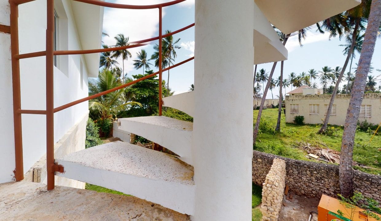 Spectacular Beachfront Villa image of guest house staircase