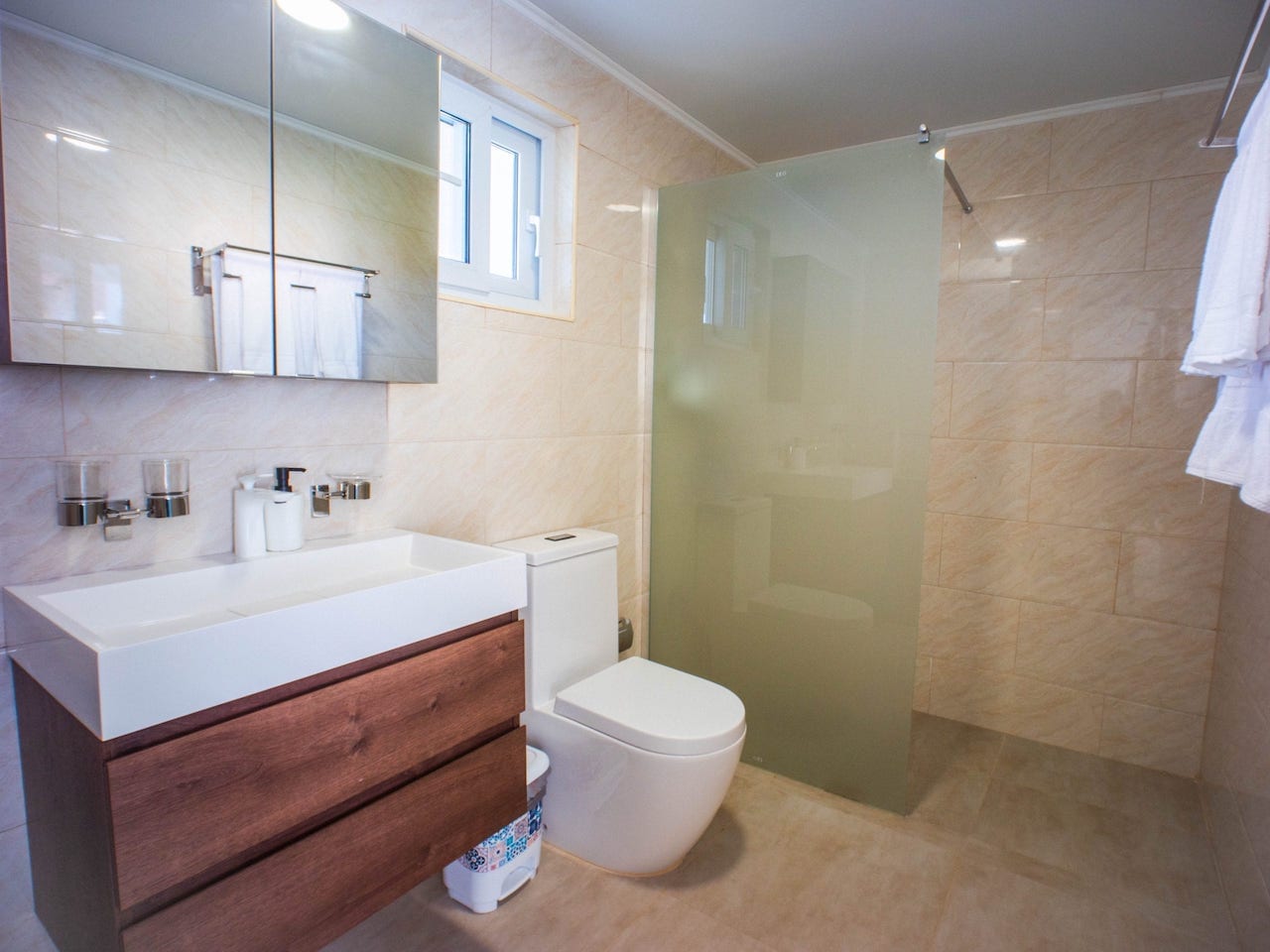 Furnished Studio In Coastal Gated Community interior full bath with shower