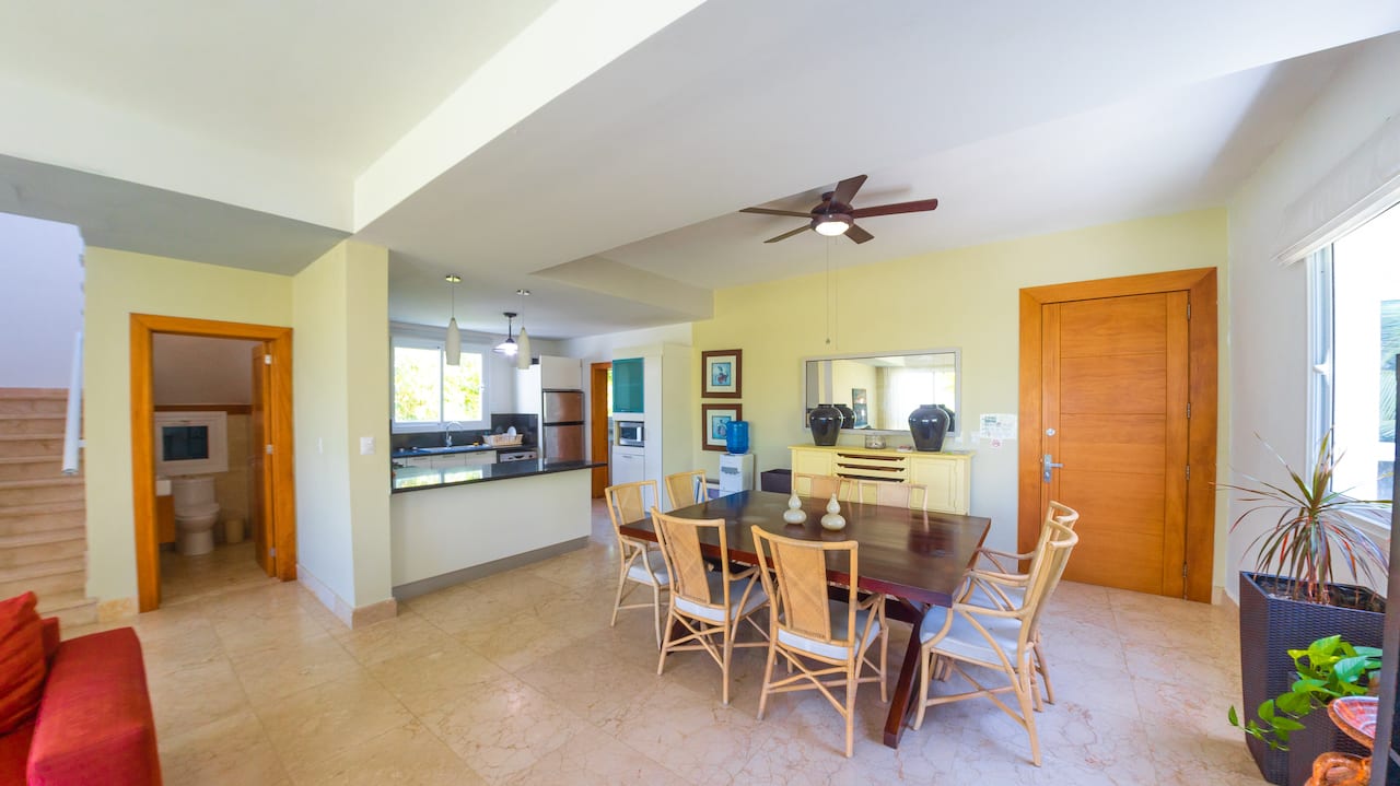 Image of Exclusive Beautiful Two Story Condo on Semi-private Beach kitchen and dining space