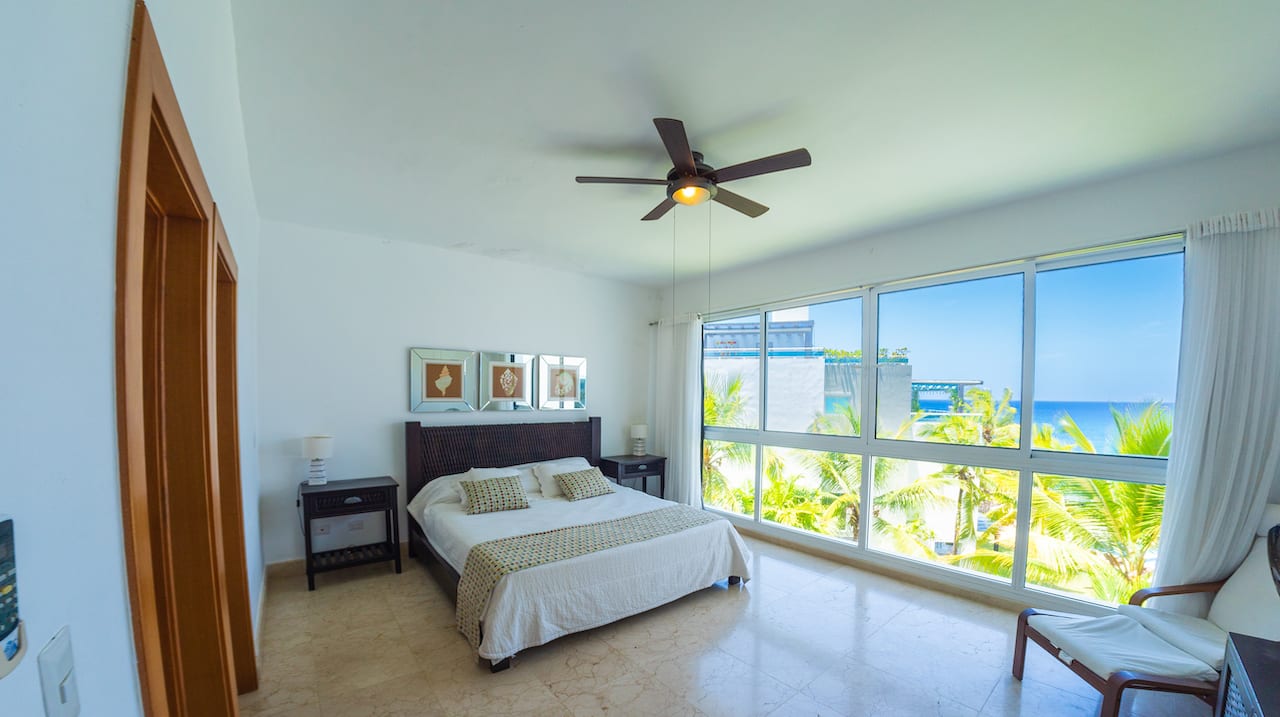 Image of Exclusive Beautiful Two Story Condo on Semi-private Beach primary bedroom with view