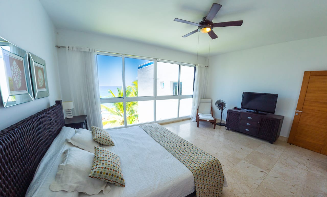 Image of Exclusive Beautiful Two Story Condo on Semi-private Beach primary bedroom