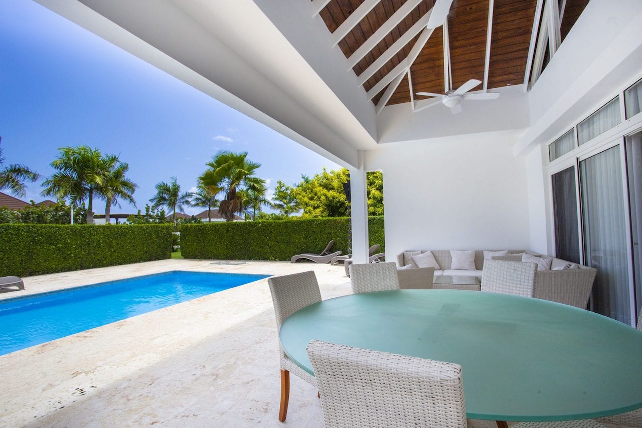 SOV Luxury Villa With Premium Finishing and Private Pool image of outdoor seating by the pool