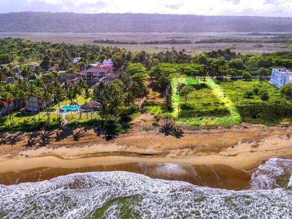 Create Your Legacy on this Prime Beachfront Property!