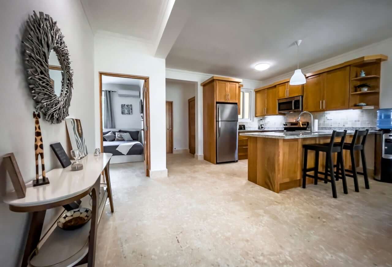 Elegant Hispaniola Beach Condo Living with Breathtaking Ocean & Mountain Scenery