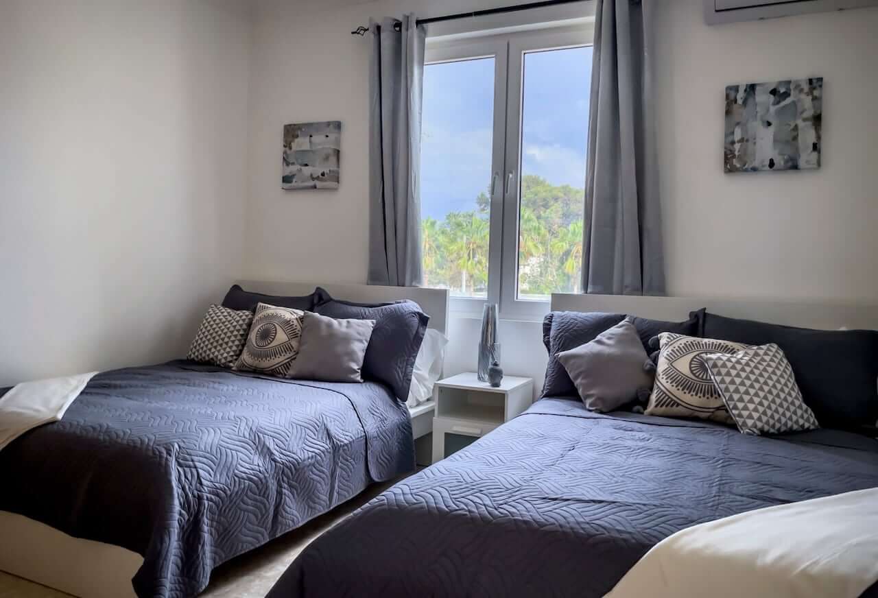 Elegant Hispaniola Beach Condo Living with Breathtaking Ocean & Mountain Scenery