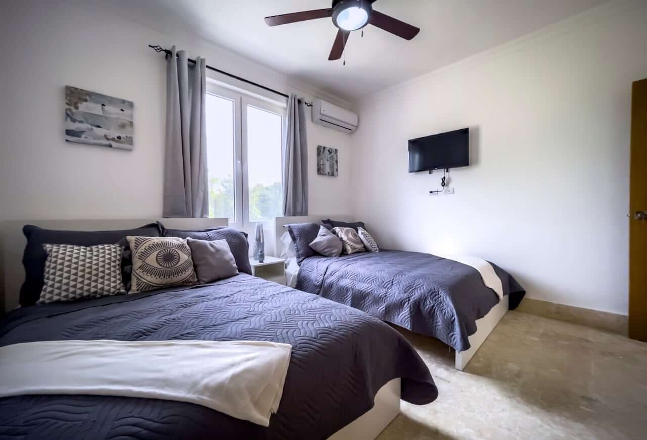 Elegant Hispaniola Beach Condo Living with Breathtaking Ocean & Mountain Scenery